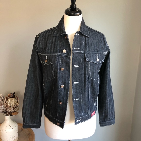 black jean jacket with white stitching
